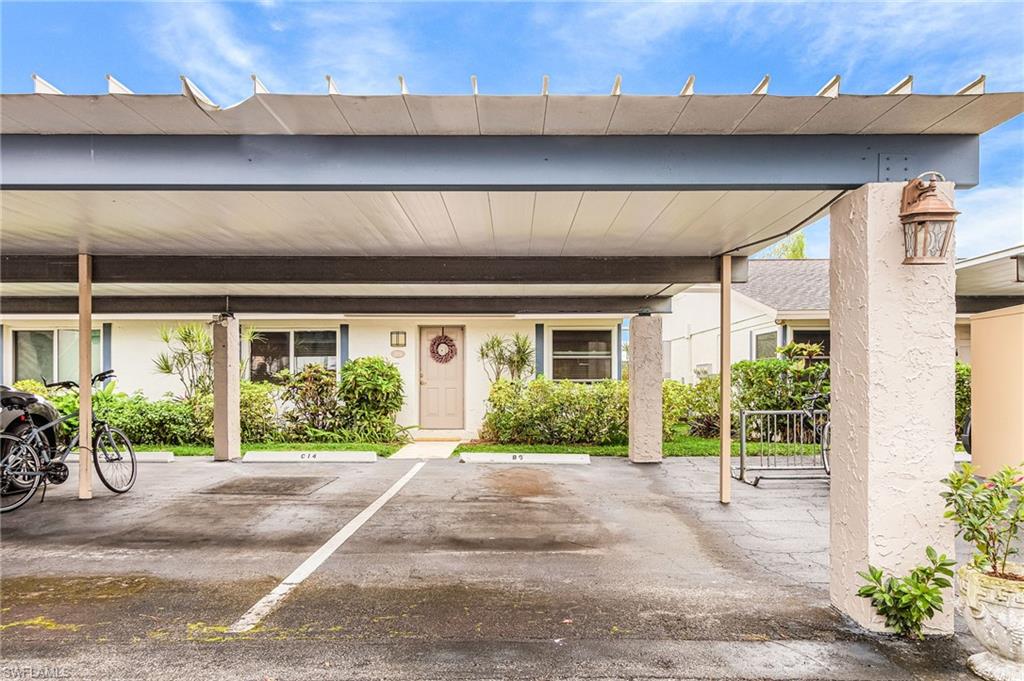 Primo carport parking space steps from front door