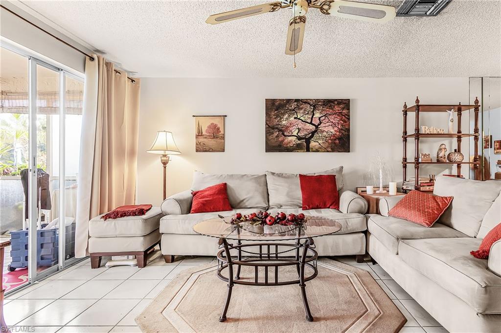 Cozy living space with beautiful lanai and views of the pool