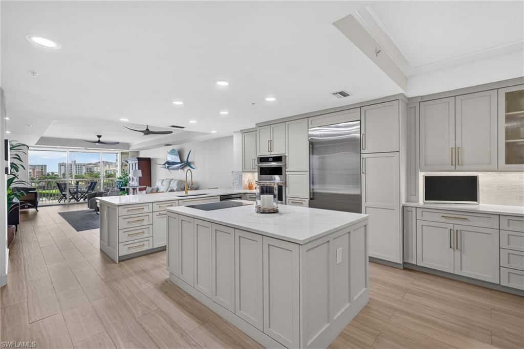 Beautifully upgraded kitched,with newer appliances, open floor plan to enjoy water views