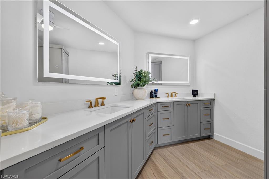 Extended vanity with double sinks and extra counter space.