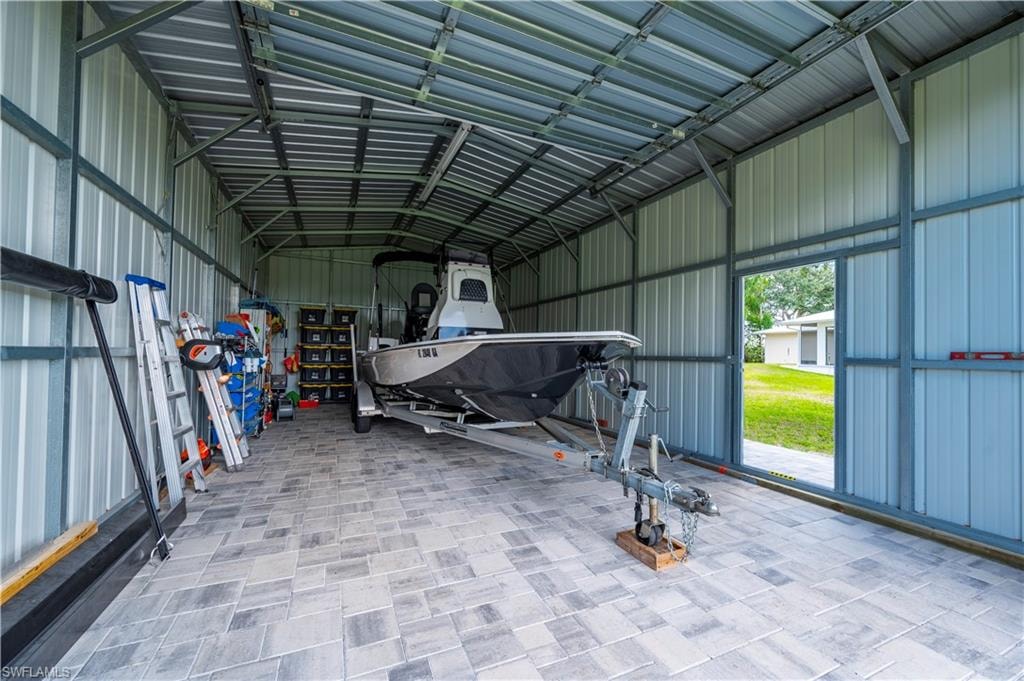 This is a 22' Blue Wave boat that fits well inside. It's negotiable too!