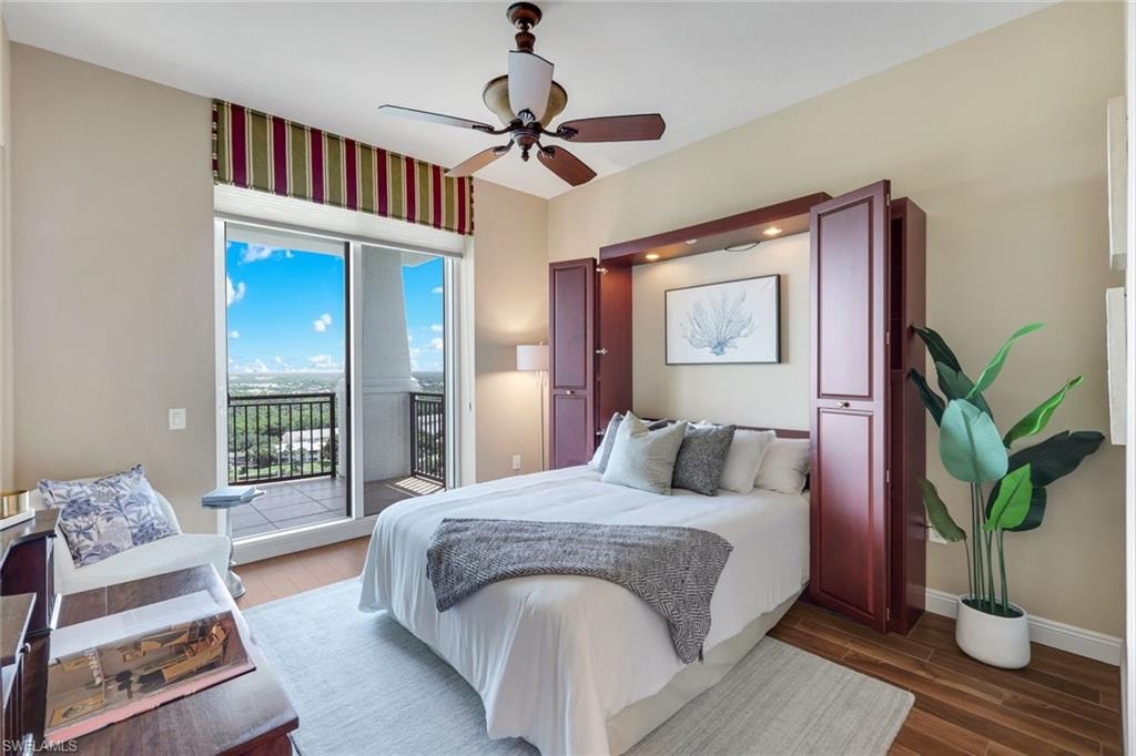 Guest suite 2 with in suite bath and shared outdoor terrace featuring a custom Murphy bed system.