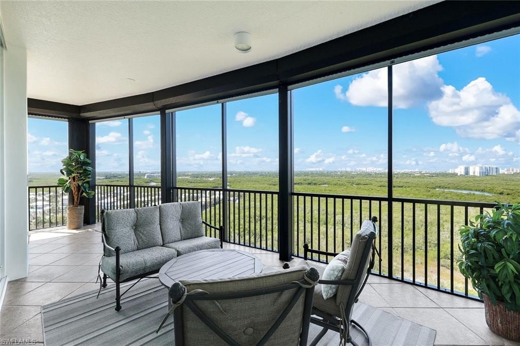 Wrap around lanai offering ample outdoor living space with hurricane protection
