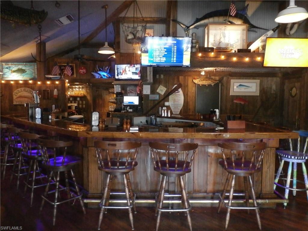 Cozy bar to meet your neighbors.