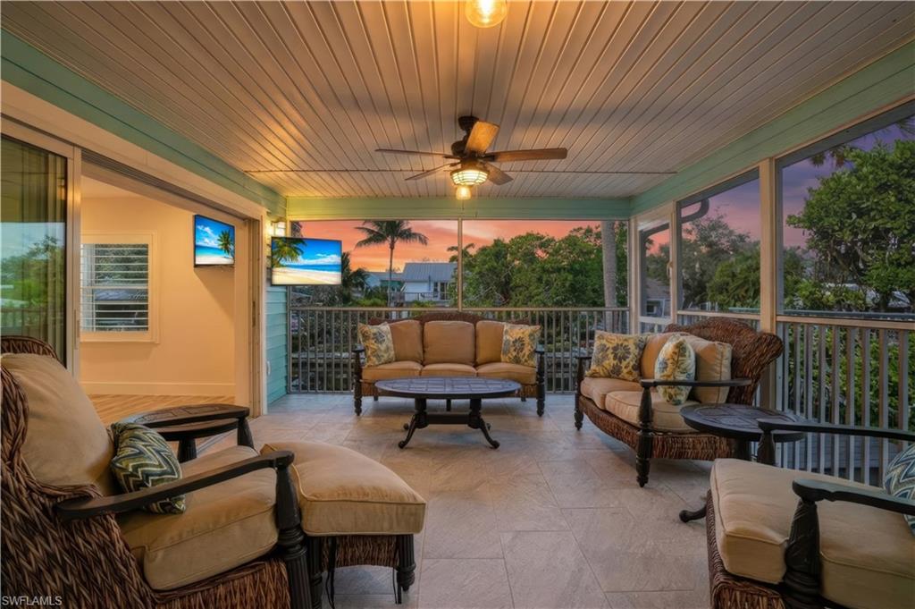 Sunroom featuring healthy amount of natural light - Virtually Edited Image