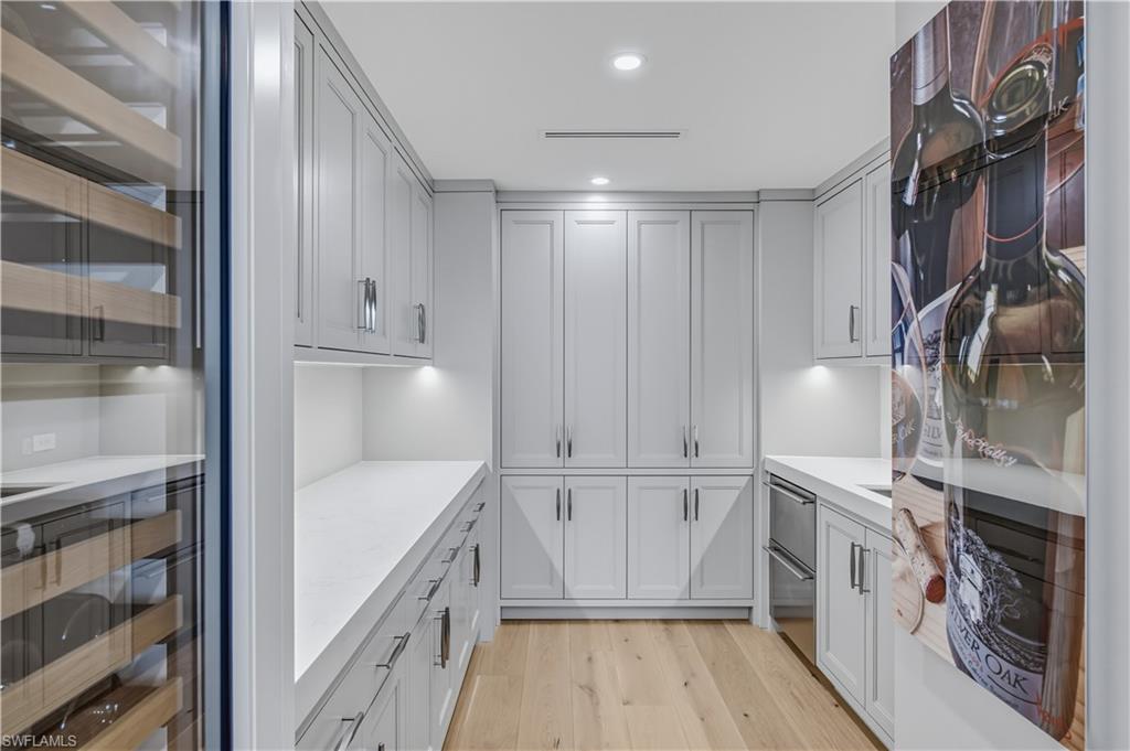 Butler's Pantry Custom Built In Cabinetry and Subzero Wine Cooler