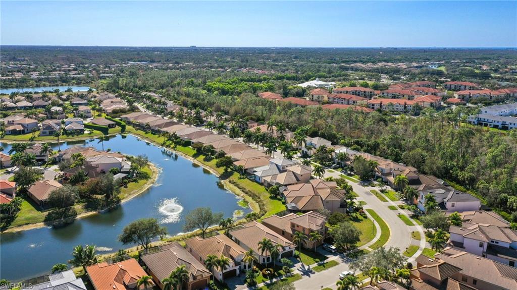 Aerial perspective showcasing a residential community with numerous homes