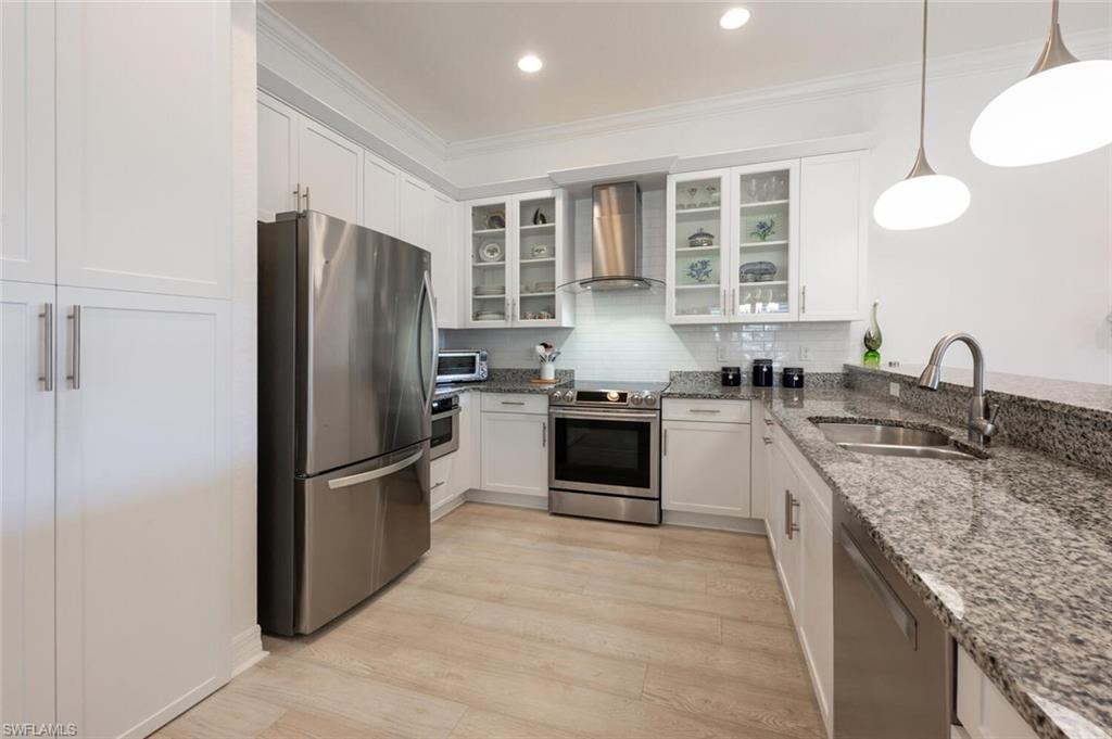 Stainless steel appliances and Pantry Cabinet