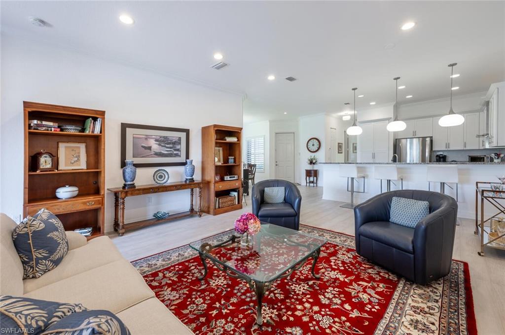 Plenty of seating in the great room currently used as a formal living room area