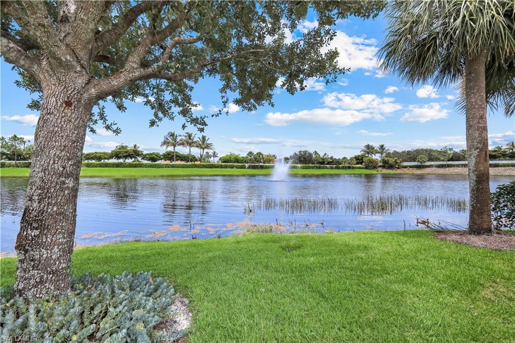 Your Oasis - expansive waterfront setting featuring a tranquil lake with a central fountain