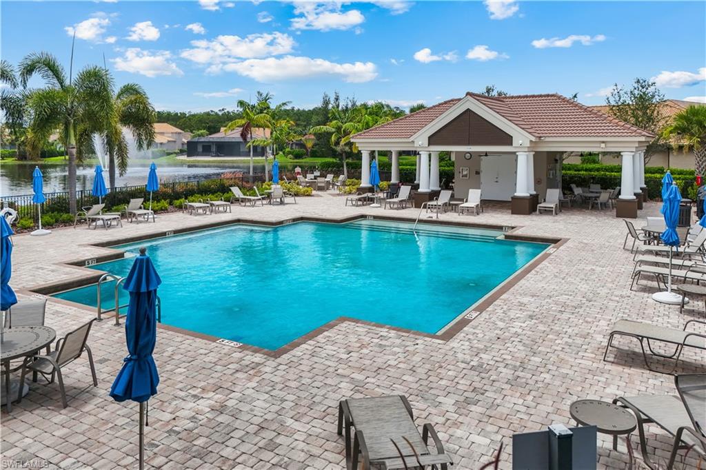 Community Pool - Close to Property; walking distance. Resort-style pool area with a covered cabana area.
