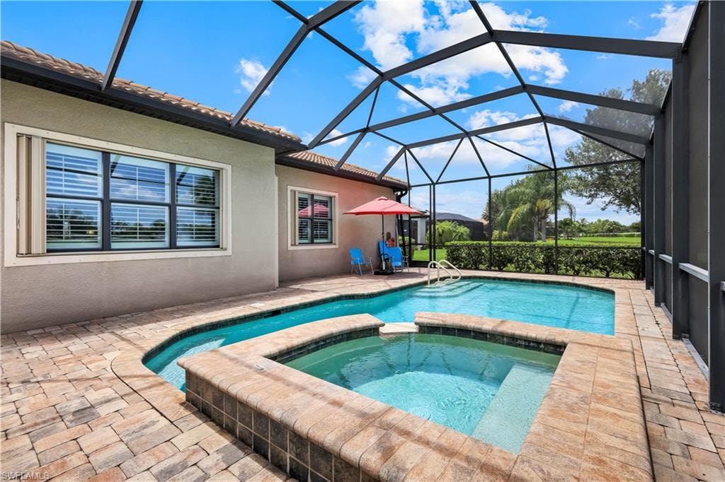Screened lanai, pool and integrated spa.  **Protection with accordion shutters.