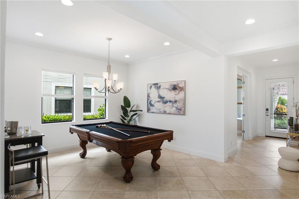 The dining room is currently set up as a pool room to benefit, entertaining and expand on the floor plan which includes several bonus areas that create versatility for any Buyer.
