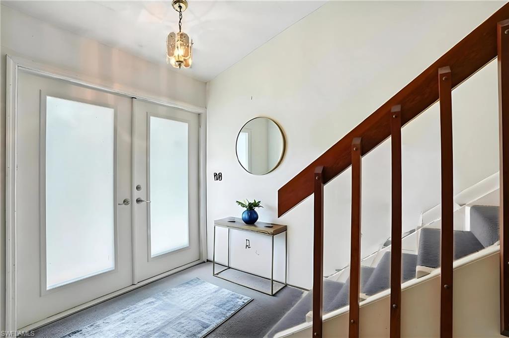 Entryway featuring french doors - Virtually Edited Image