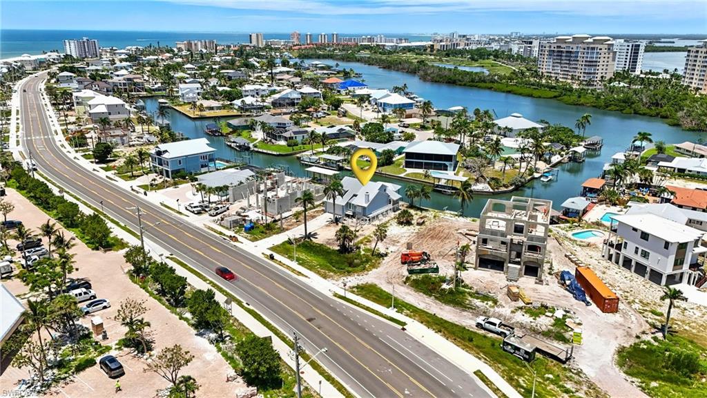 View of urban area featuring a large body of water - Virtually Edited Image