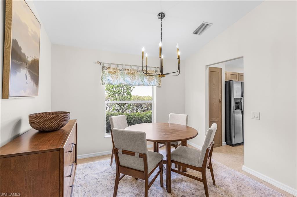 A formal dinning space with a fresh sparkle.