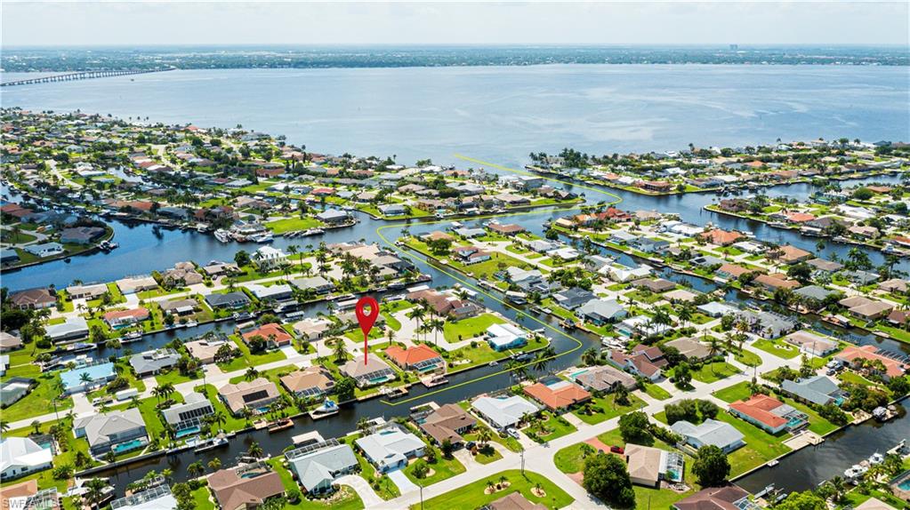Waterfront residential neighborhood featuring canals and direct access to a large body of water