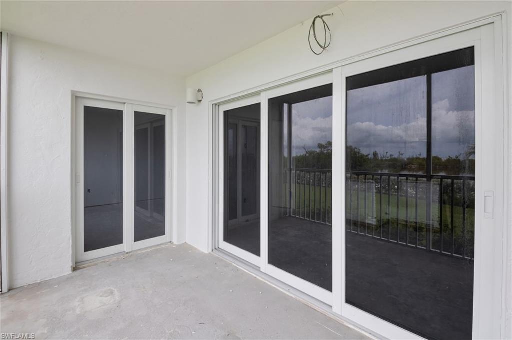 Screen in lanai with impact slides to access the condo