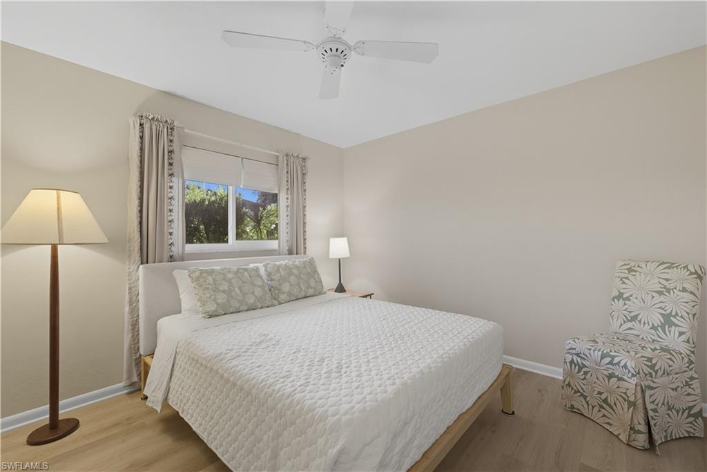 Bedroom featuring light wood-style flooring and a ceiling fan
