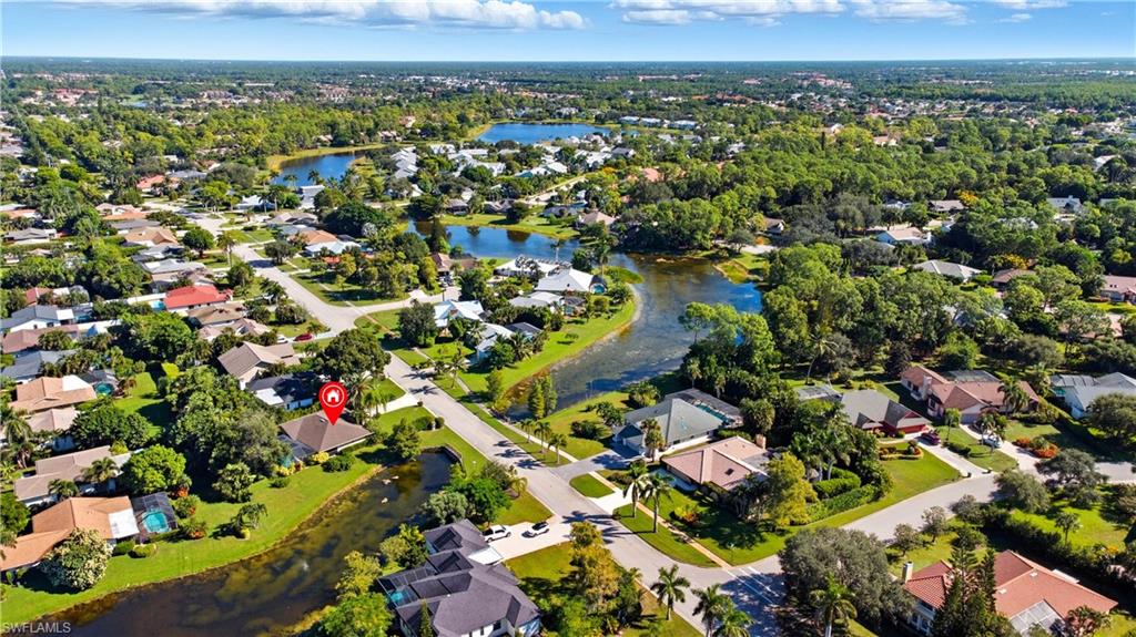 View of property location featuring nearby suburban area and a large body of water