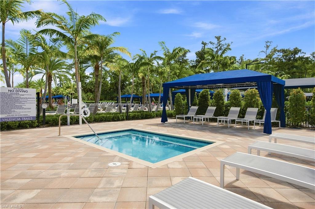 spa / hot tub / pool cabanas and lounge chairs