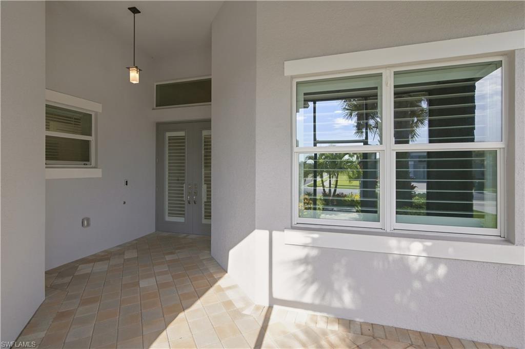 cover and screened lanai, glass front doors