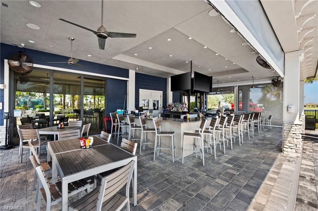 Dining room featuring recessed lighting and a ceiling fan