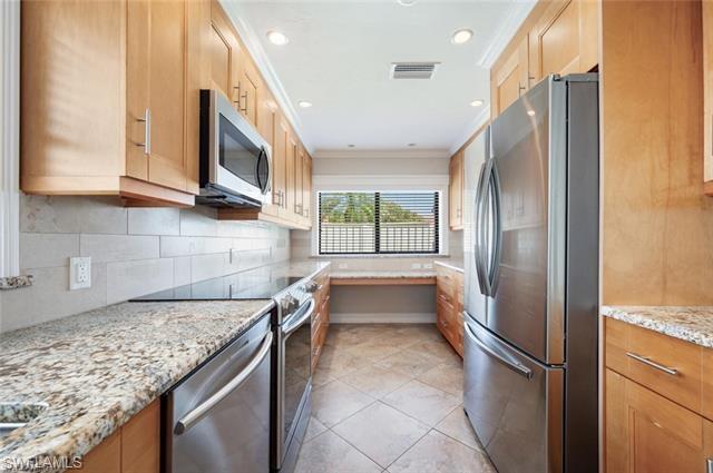 Upgraded Kitchen with stainless steel finishes fridge/freezer