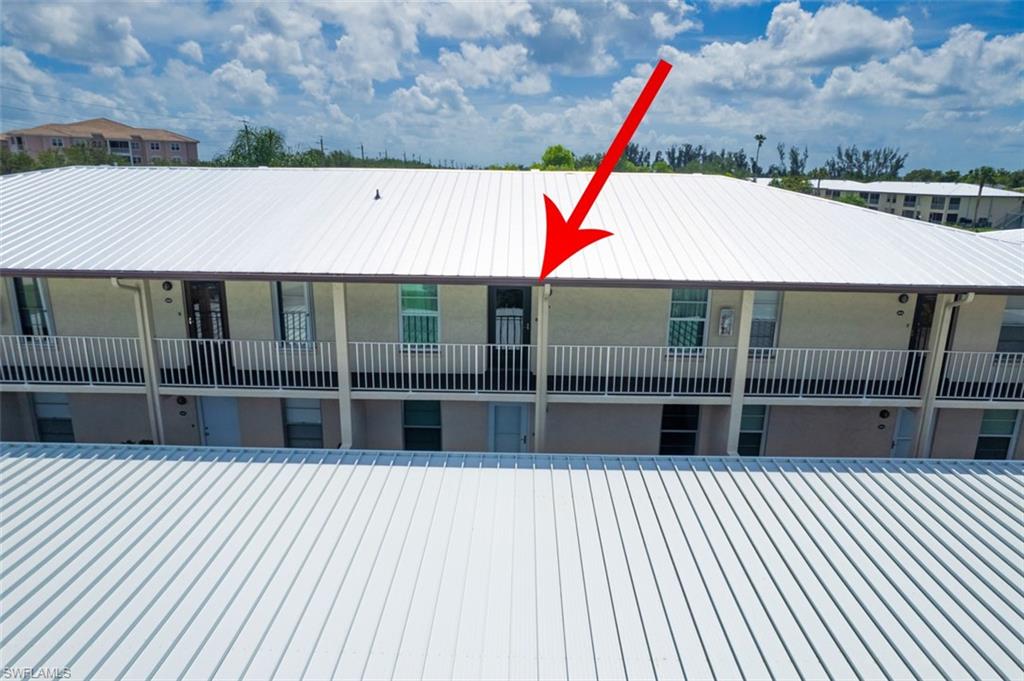 View of front facade featuring stucco siding