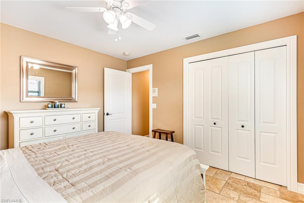 Neutral-toned walls complement the textured tile flooring - Virtually Edited Image