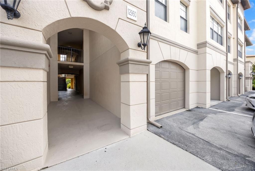 driveway/garage next to walkway