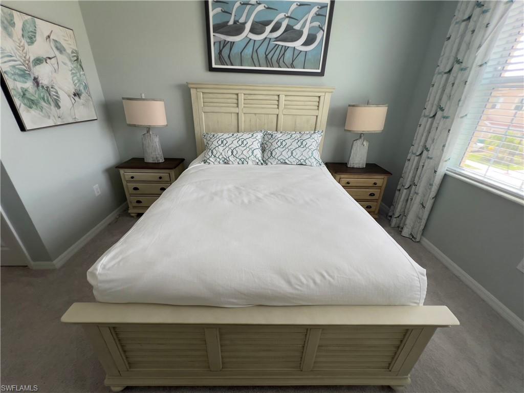 Bedroom featuring carpet flooring