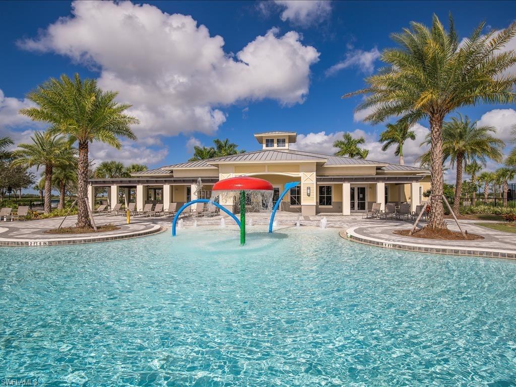 View of pool featuring a patio and pool water feature