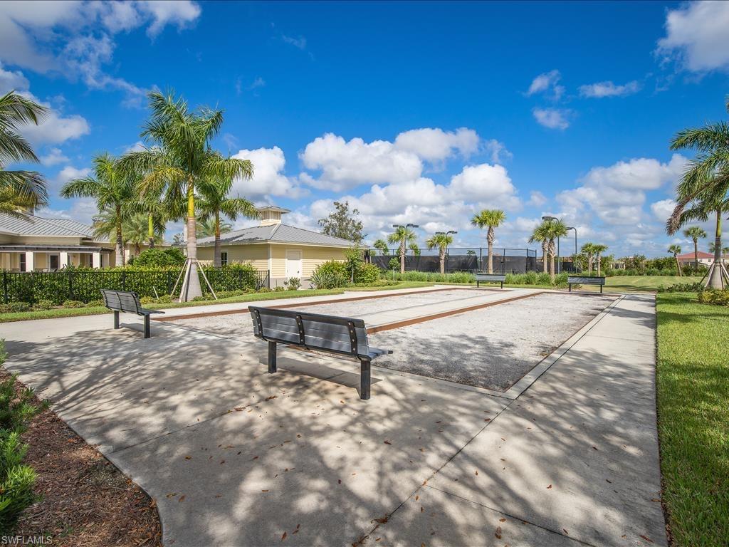 View of home's community featuring a yard