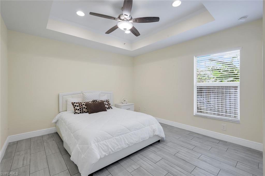 Recessed lighting in a tray ceiling with a ceiling fan
