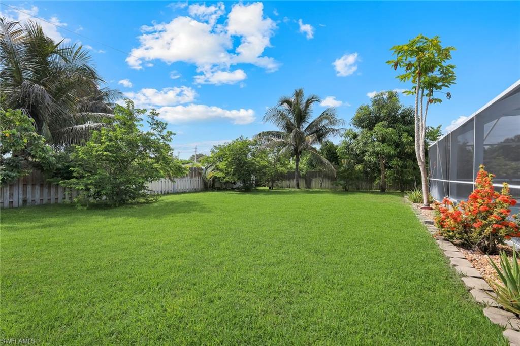 Expansive green lawn providing ample outdoor space