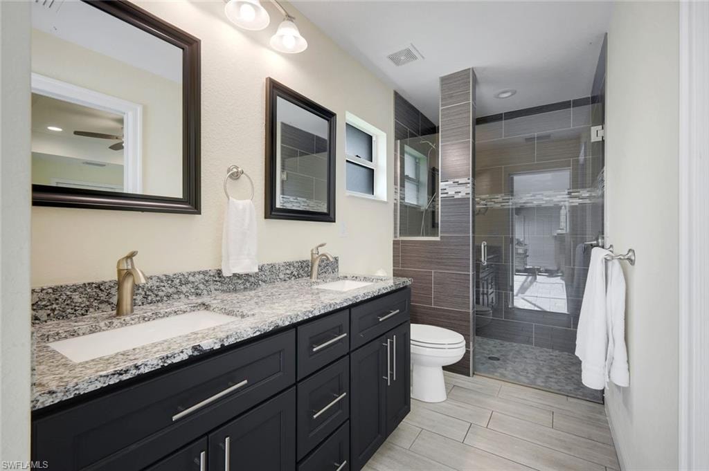 Double vanity with granite countertops and undermount sinks