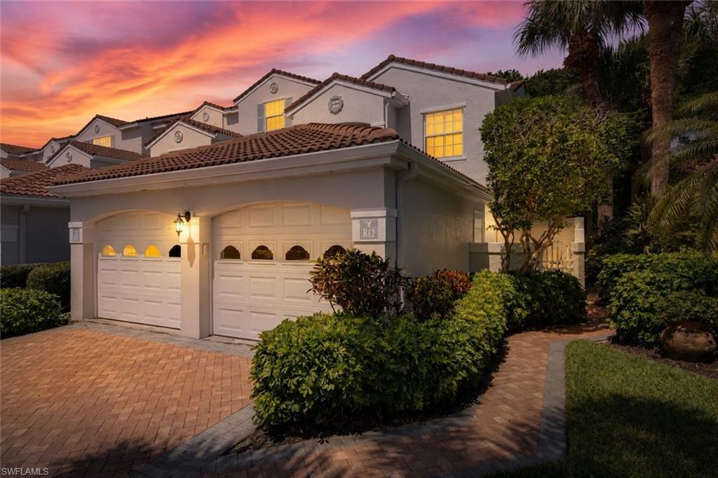 FRONT OF CONDO AND GARAGE