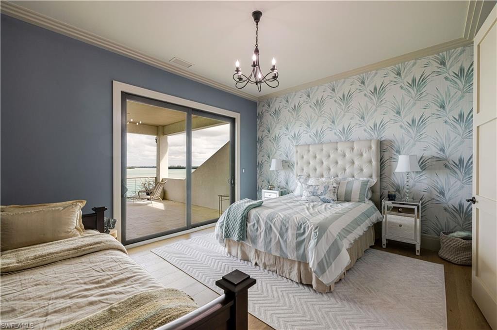 Room featuring a sliding glass door opening to an outdoor balcony
