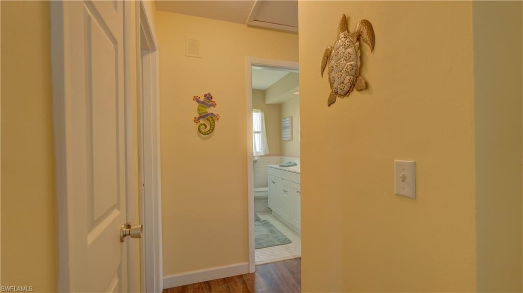 View of hallway leading to bedrooms and guest bathroom