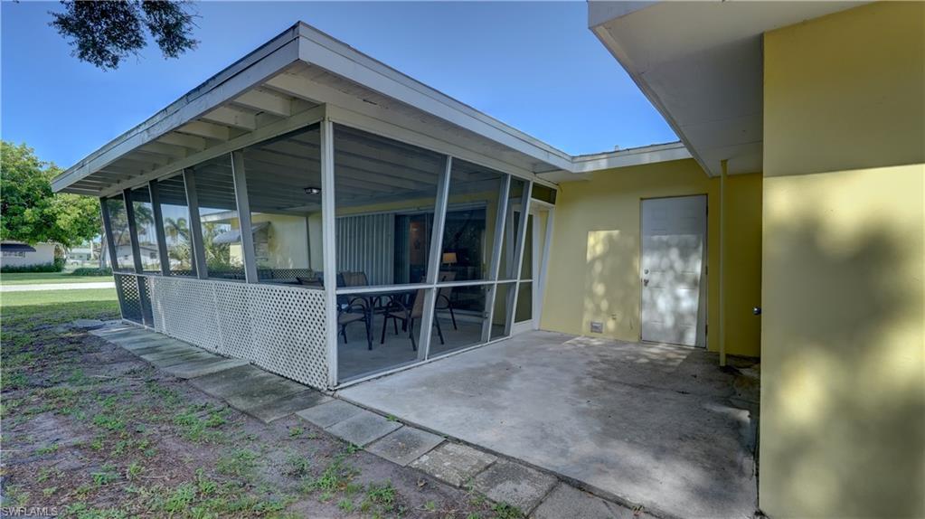 Patio & Screened Lanai...doorway is rear door to garage