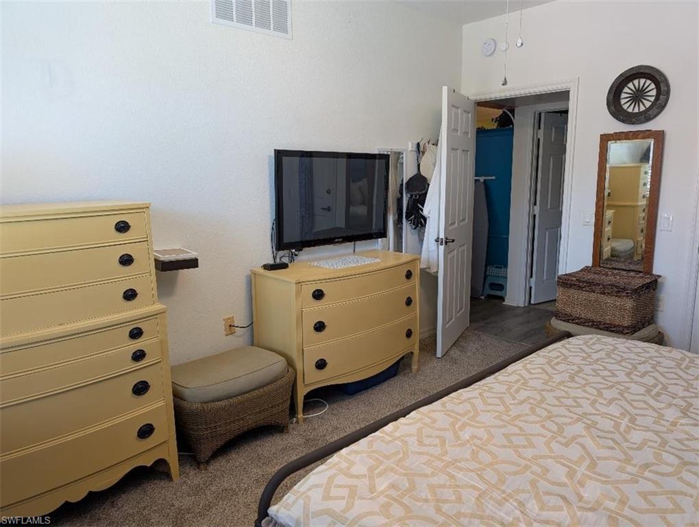 Bedroom featuring carpet
