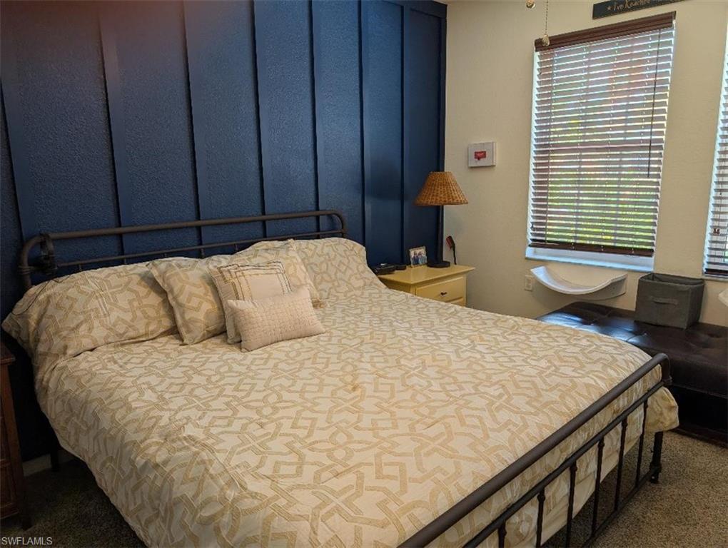 Bedroom featuring carpet