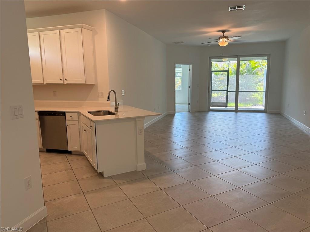 Open-concept living area featuring a kitchen with the living area