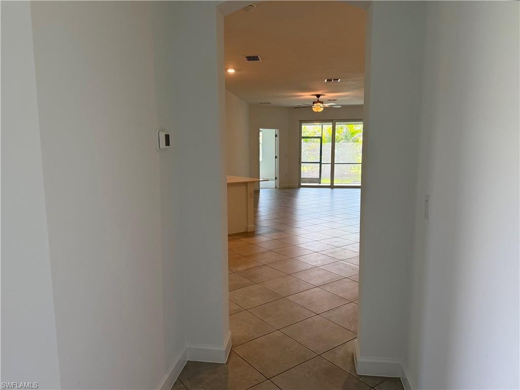 Left side of the house displaying the living room, dining area, and kitchen