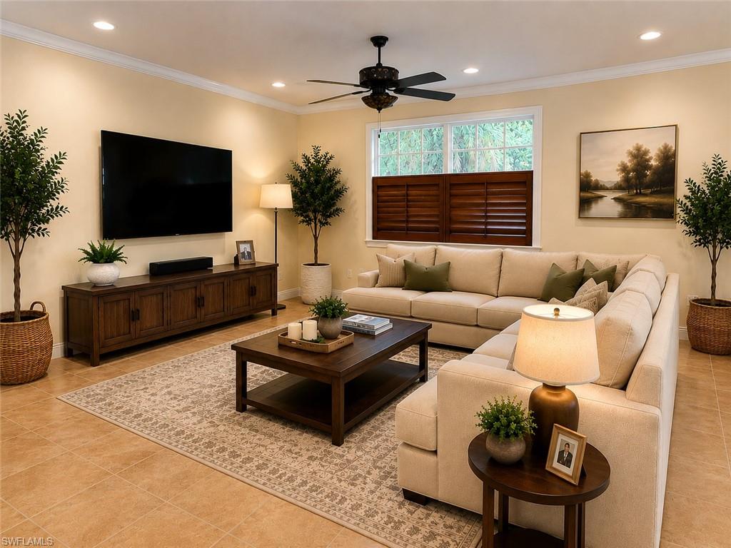 Spacious living area featuring tile flooring, recessed lighting, crown molding, a ceiling fan, and window shutters