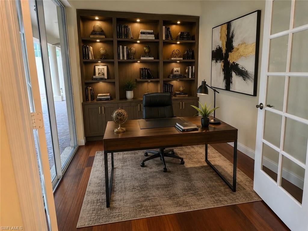 Den off the kitchen with access to the courtyard.
