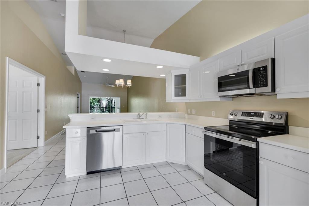 KITCHEN WITH JUST INSTALLED STAINLESS STEEL APPLIANCES