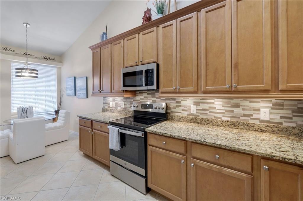 Elevated Wood Cabinets with granite countertops