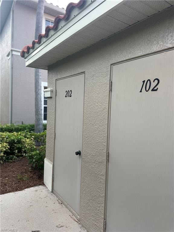 Assigned storage space by covered parking area